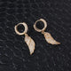 Piercing oreille homme ailé